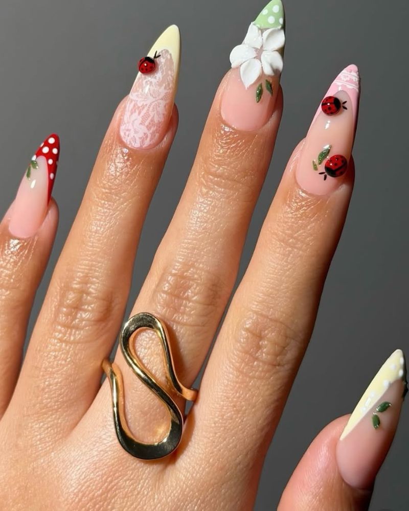 pastel nail art design for spring with stiletto pastel tips and ladybugs nail art