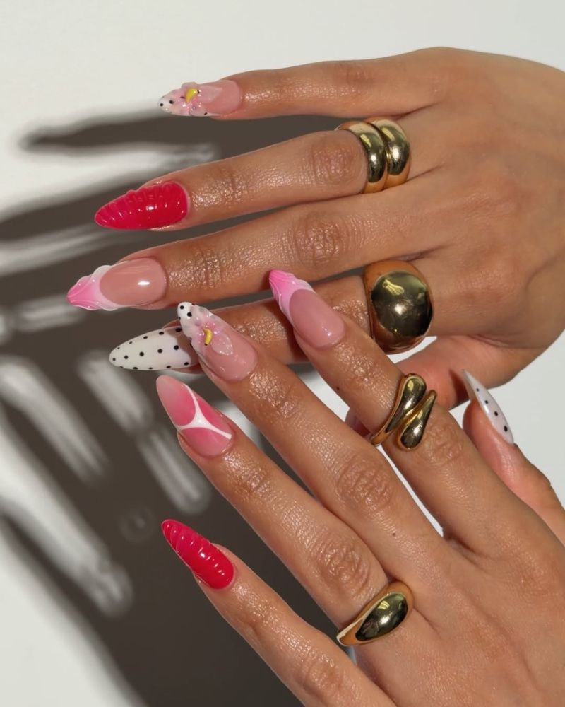 soft pink and white polka dot design for summertime manicure
