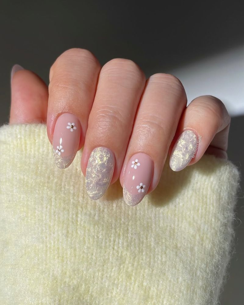 shimmery nails on a nude almond manicure