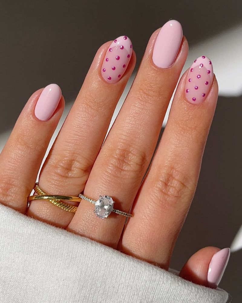 light pink manicure with polka dots