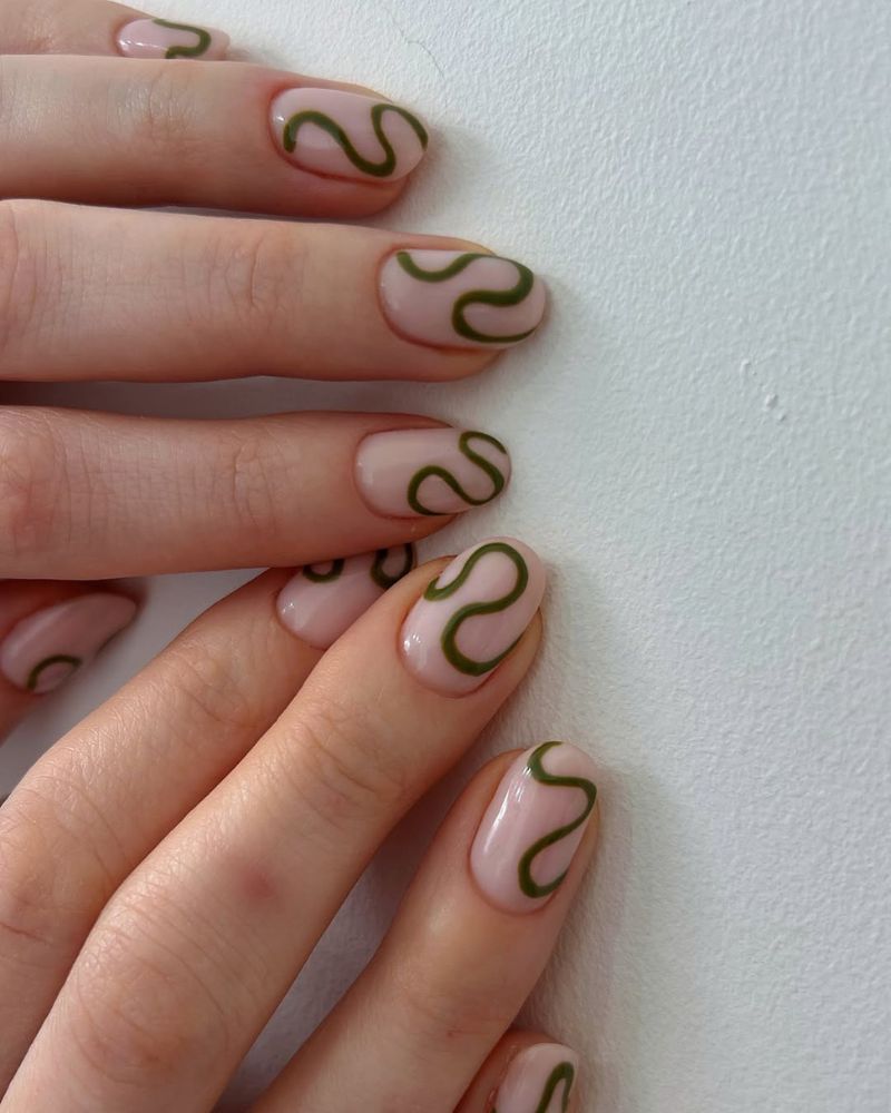 simple nails with green swirls for spring nails