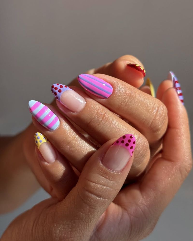 pink, purple and red summer nails with polka dots and lines