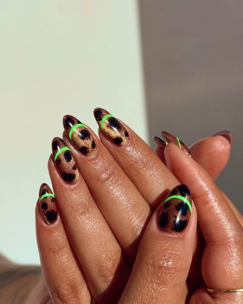 tortoise shell nails with neon green french outline for summer manicure