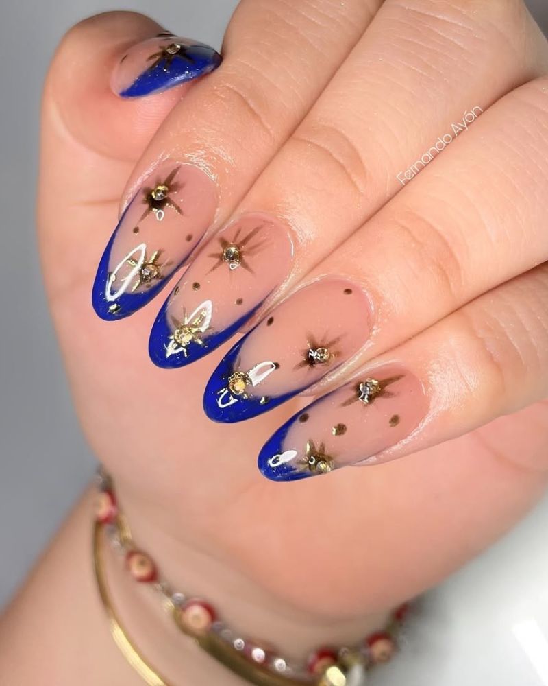 blue french nails, gold stars nail art