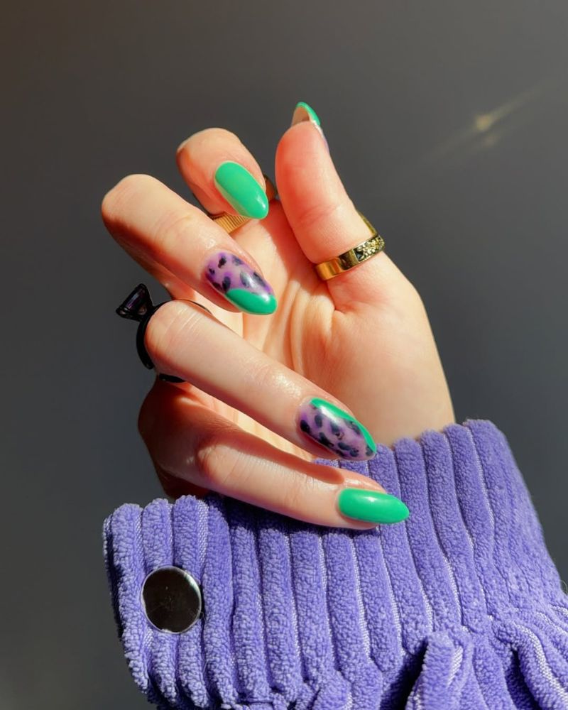 animal print nails with bright green and purple