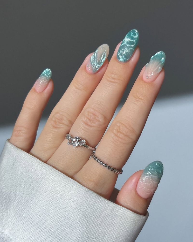 blue mermaid nails with ocean nail art
