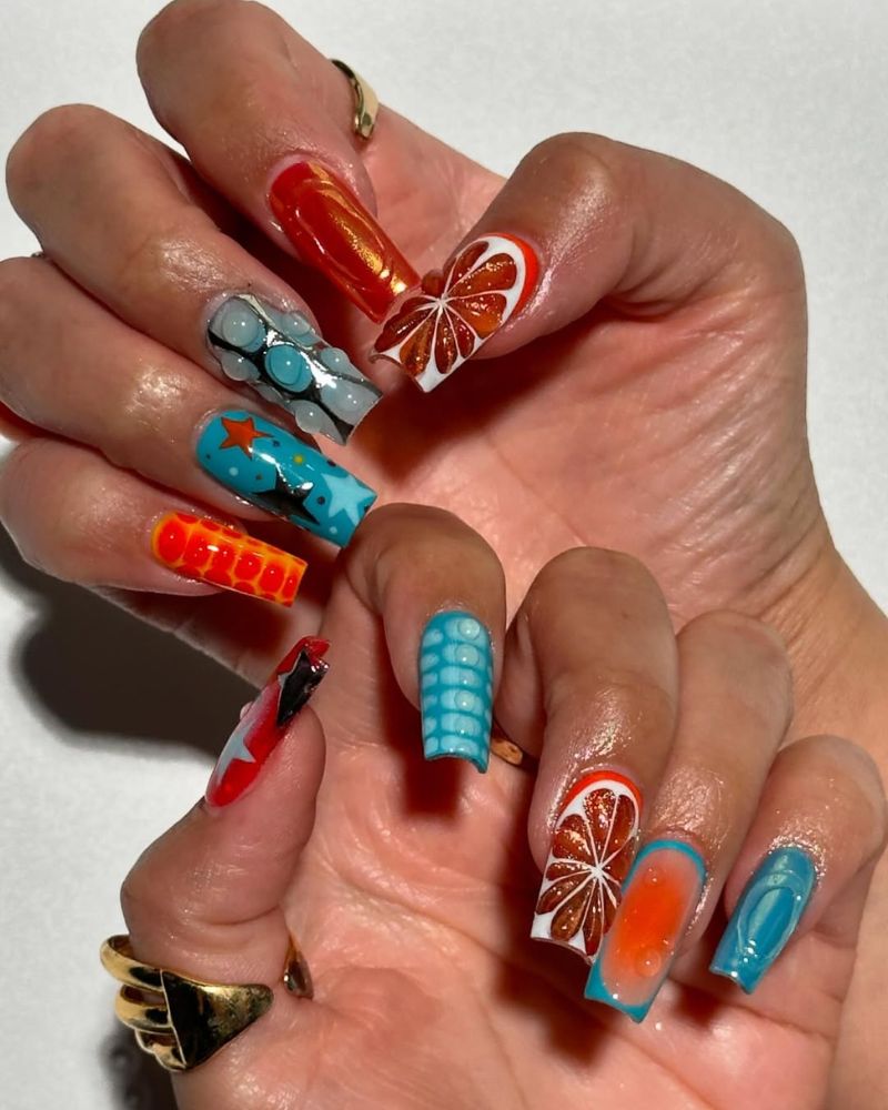 long square nails pink blue and orange nail art