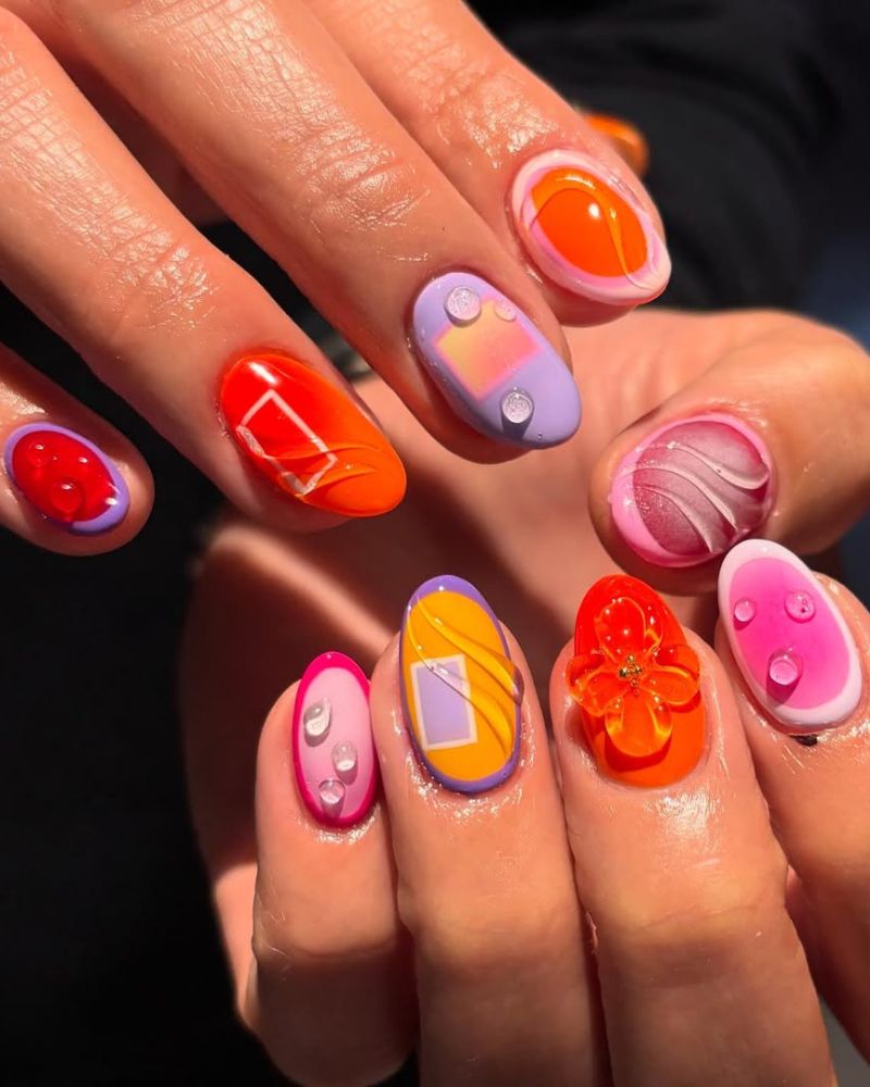 round nails with colorful nail art for summer