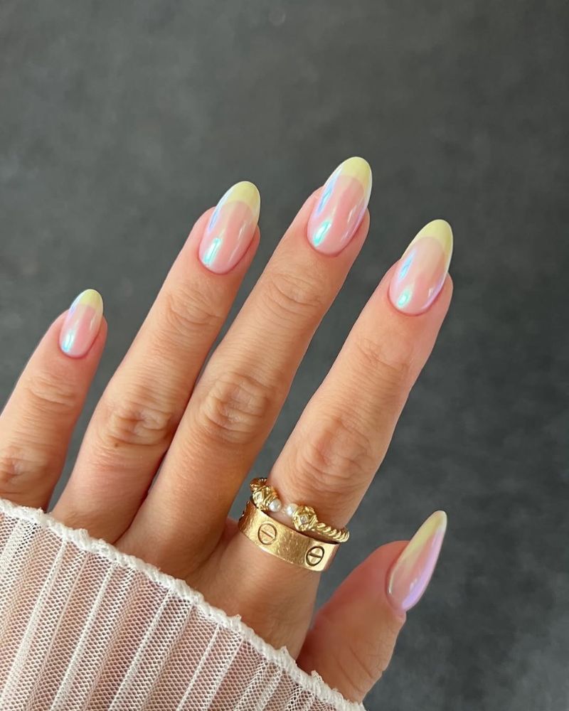 simple yellow french tips on a nude base with chrome