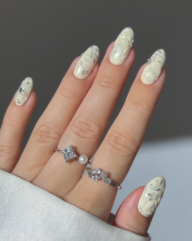 butter yellow nails with dainty nail art