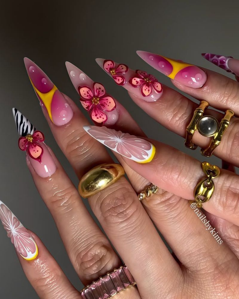 long stiletto nails with floral and citrus nail art for summer