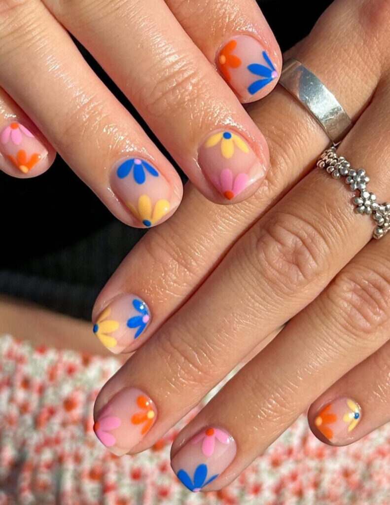 Colorful pink, yellow, blue & orange daisies designs