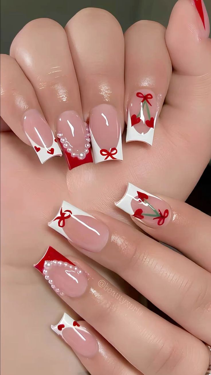 Romantic Red and White Valentine's Nail Art with Playful Accents