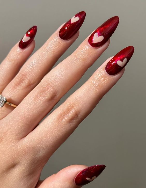 Glamorous Red Valentines Nails with Heart Accents