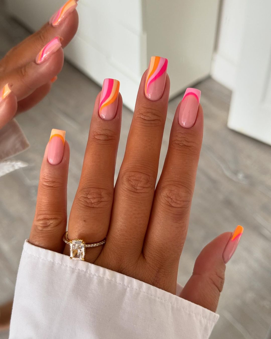 Ice cream swirl nails with Y2K retro vibe