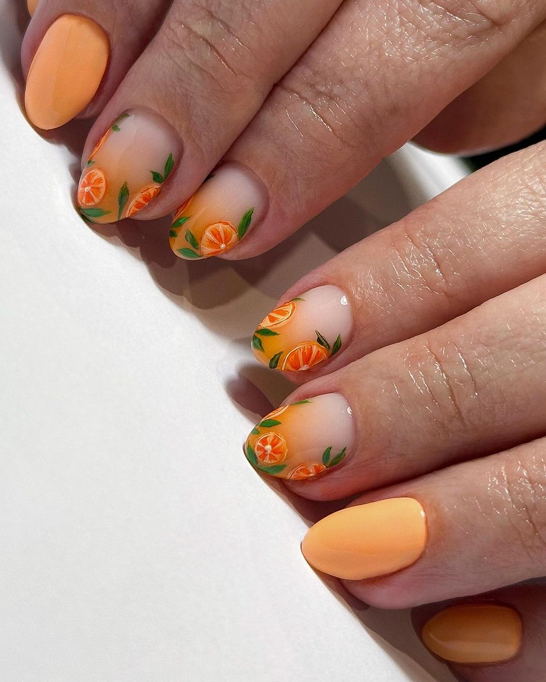 Fresh orange coloured nails