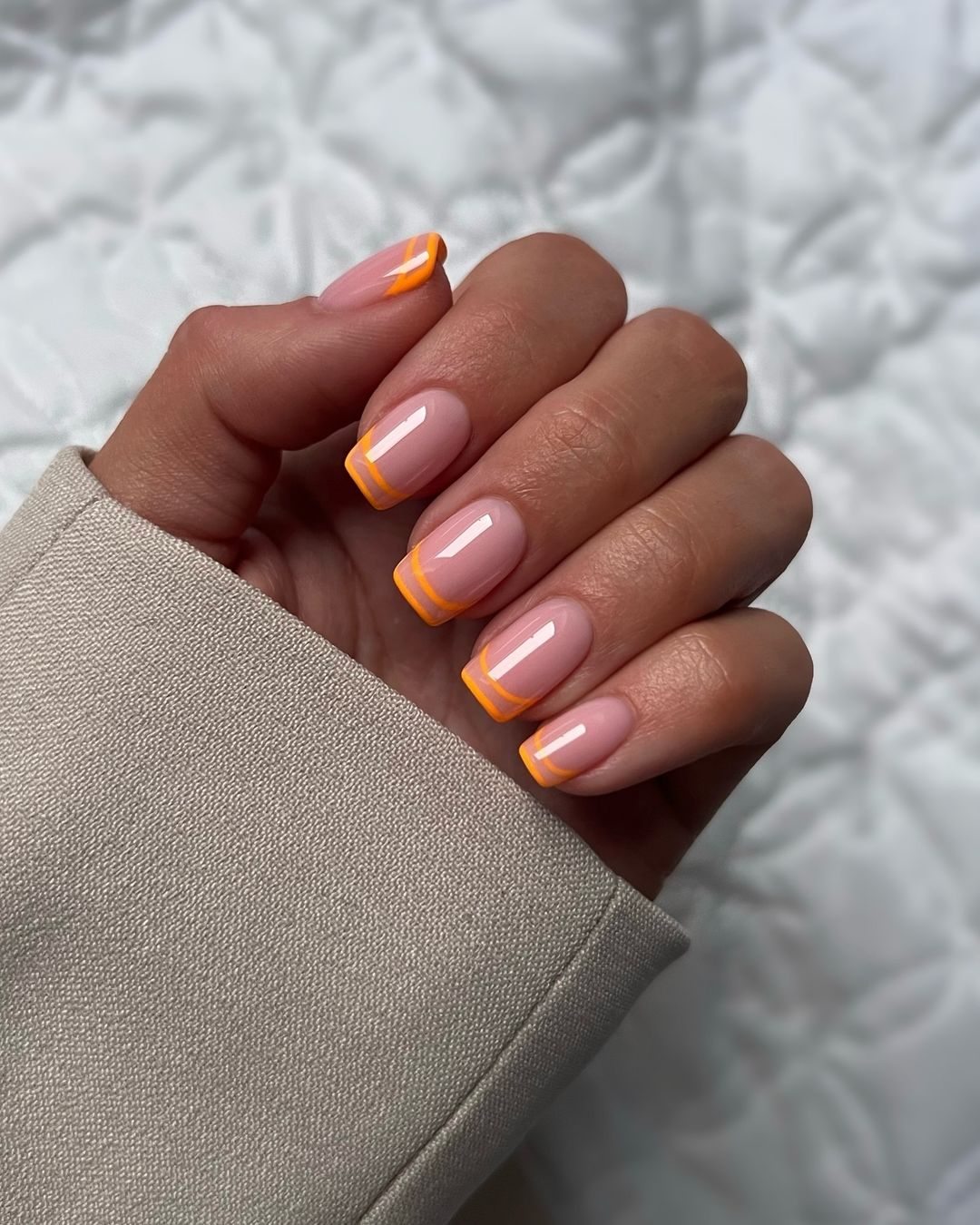 Graphic line art orange nails