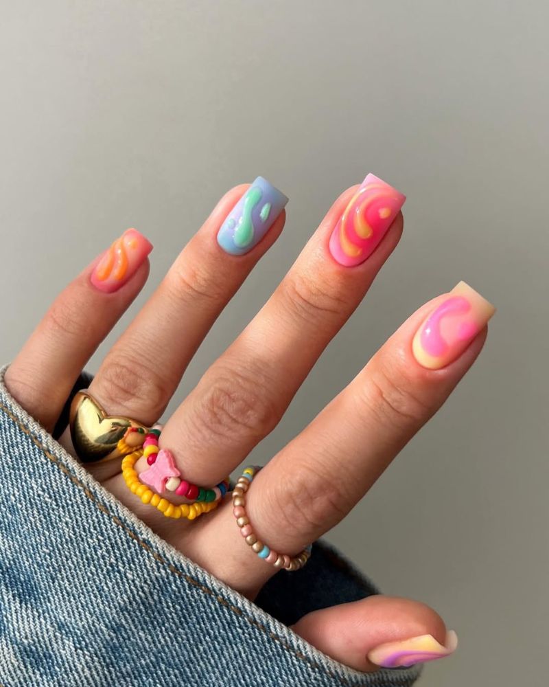 square nails with summer nail art and colorful base
