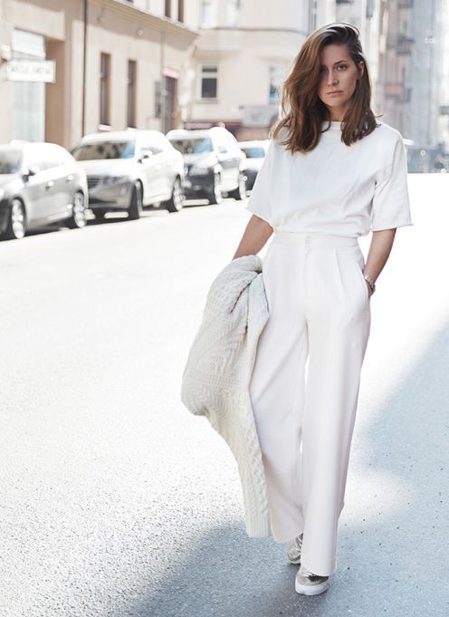 26. "Chic Street: Effortless Elegance in All-White"