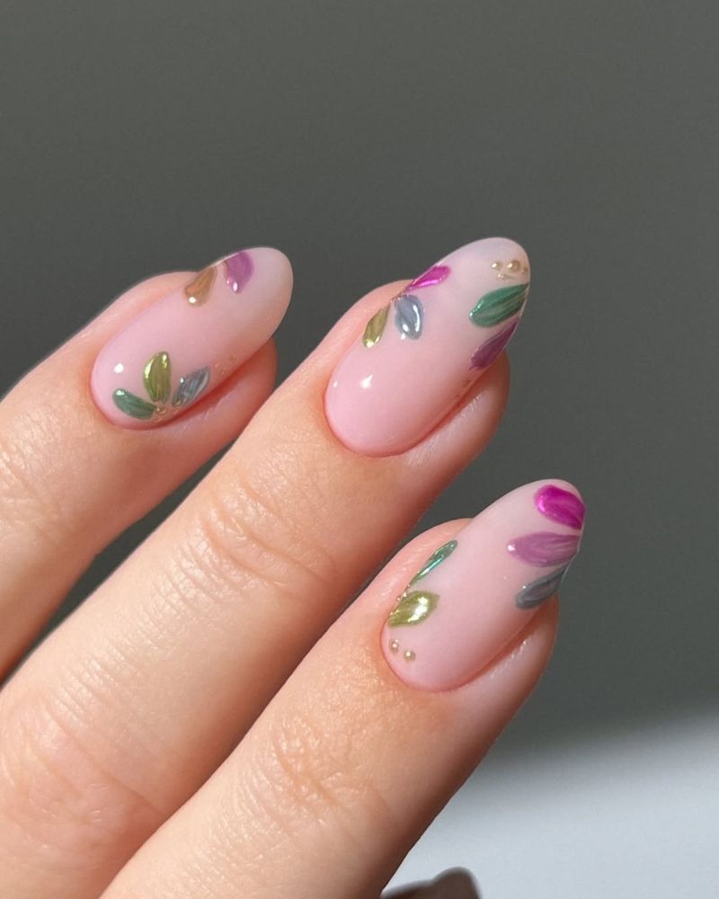 nude nails with colorful petals for spring nail art design