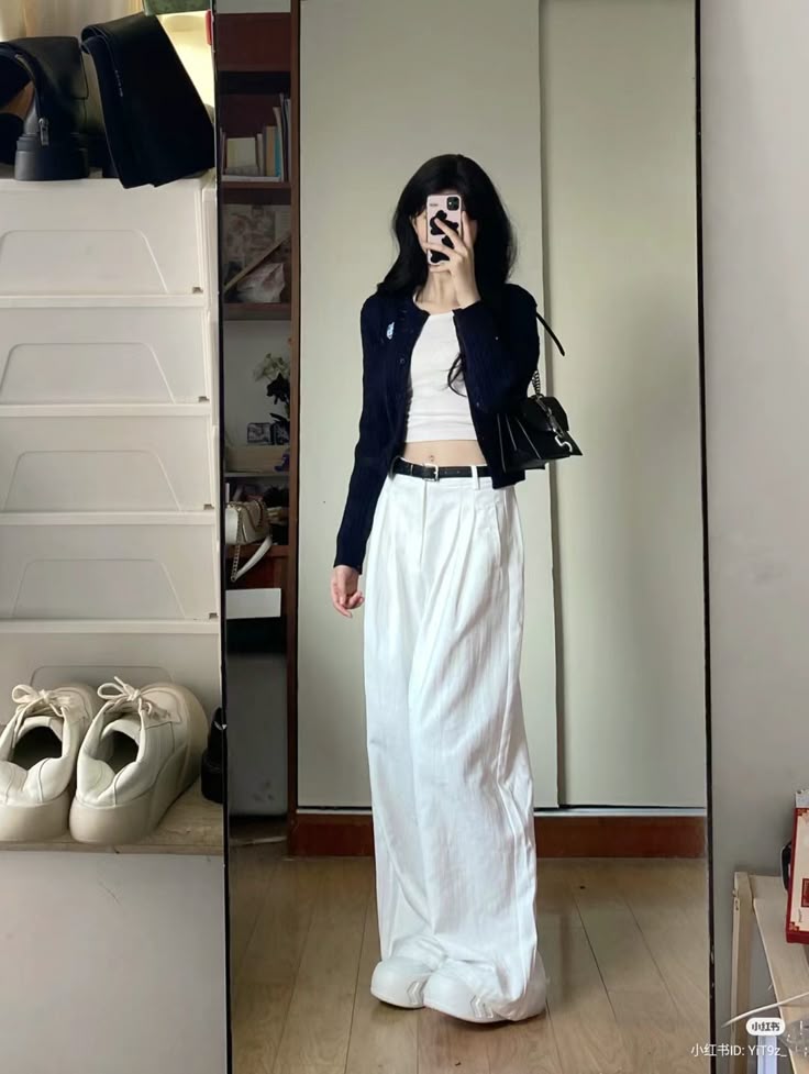 15. Effortless Elegance: White Trousers With a Classic Touch