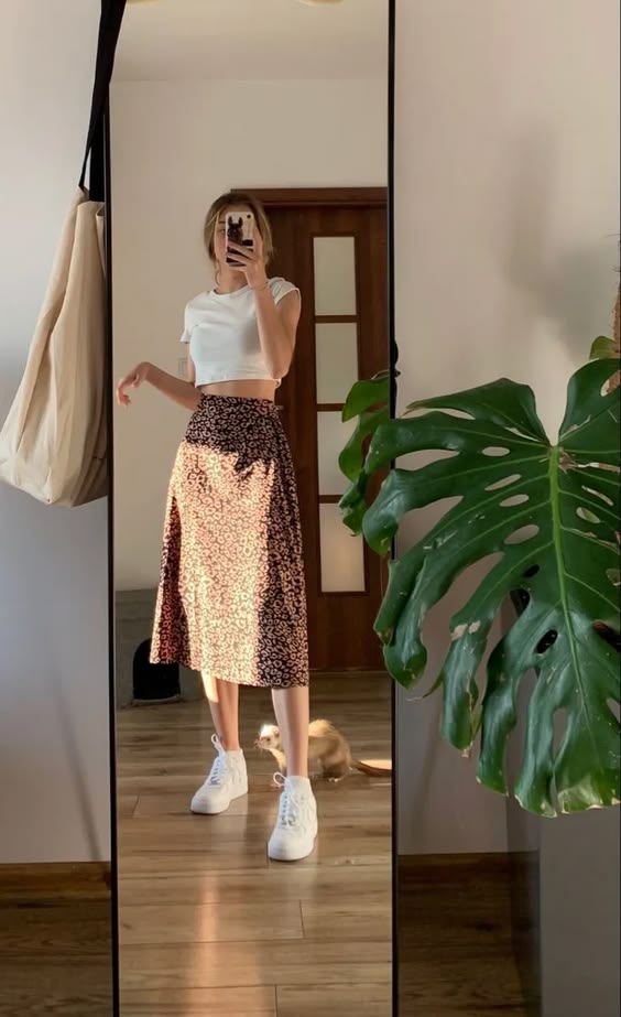 22. Effortless Spring Elegance: Floral Midi Meets Casual Vibes