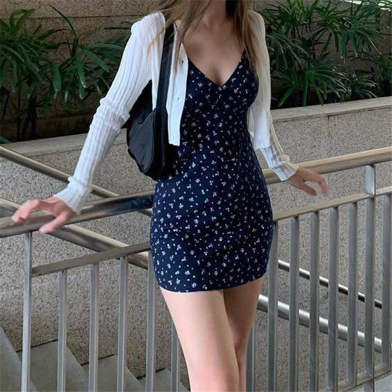 33. Effortless Elegance in a Navy Floral Spring Dress