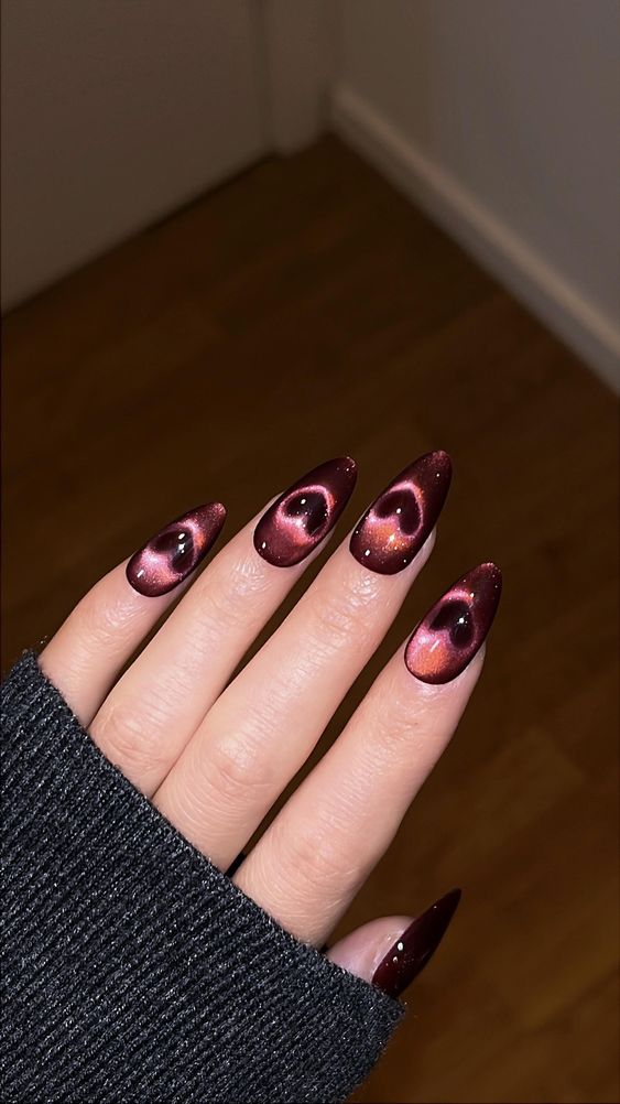 Enchanting Burgundy Galaxy Nails with a Heartfelt Twist