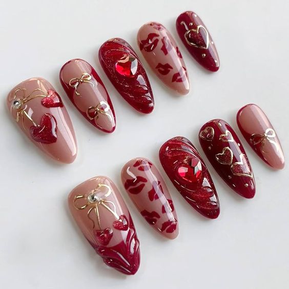 6. Romantic Red and Nude Valentine’s Nail Art with 3D Elegance