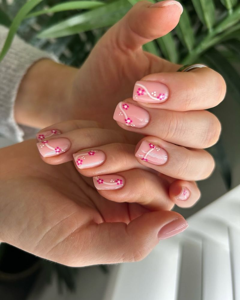 nude nails with floral nail art design
