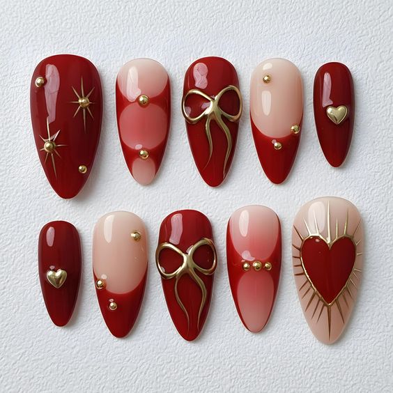 7. Romantic Red and Gold Valentine Nails with Luxurious Accents