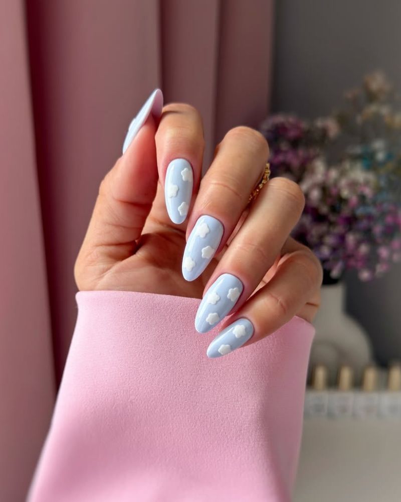 sky blue summer nails with cloud nail art