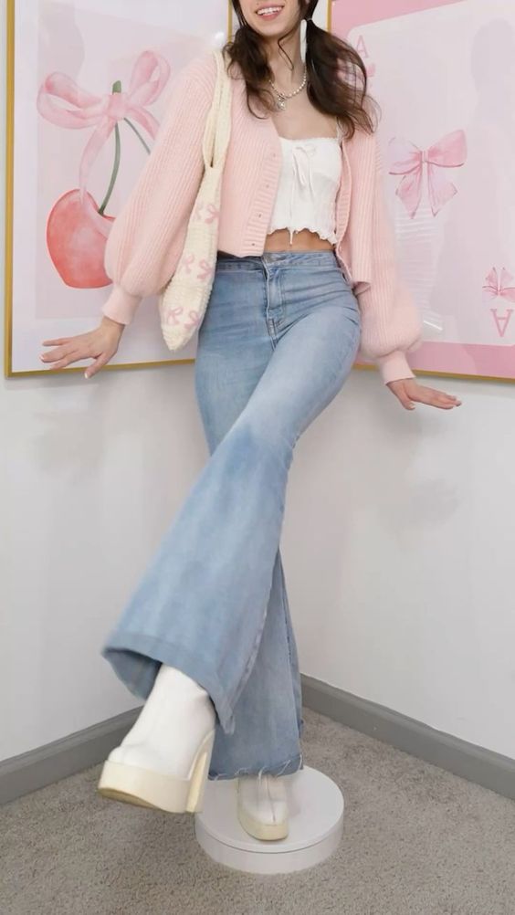 2. Effortless Charm with a Soft Pink Cardigan and Flared Denim