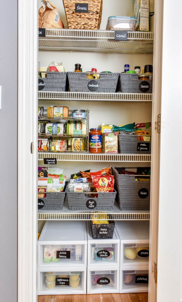 This small organized pantry closet on a budget with shelves and baskets is full of cheap and easy ideas to keep all your food visible and easy to access!