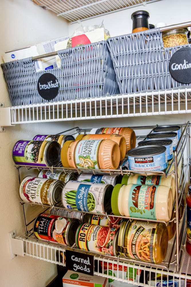 This small organized pantry closet on a budget with shelves and baskets is full of cheap and easy ideas to keep all your food visible and easy to access!