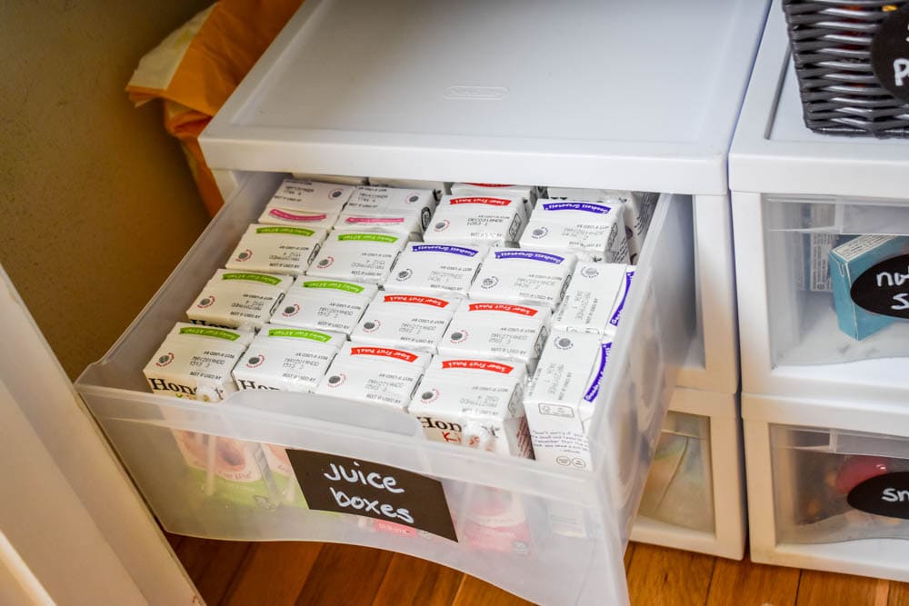 This small organized pantry closet on a budget with shelves and baskets is full of cheap and easy ideas to keep all your food visible and easy to access!