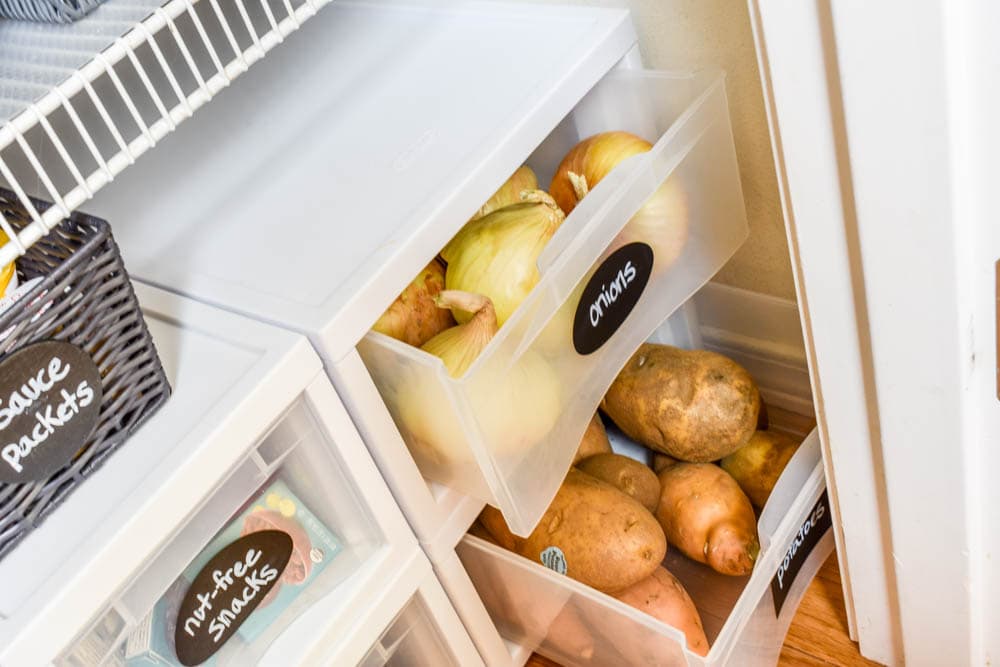 This small organized pantry closet on a budget with shelves and baskets is full of cheap and easy ideas to keep all your food visible and easy to access!