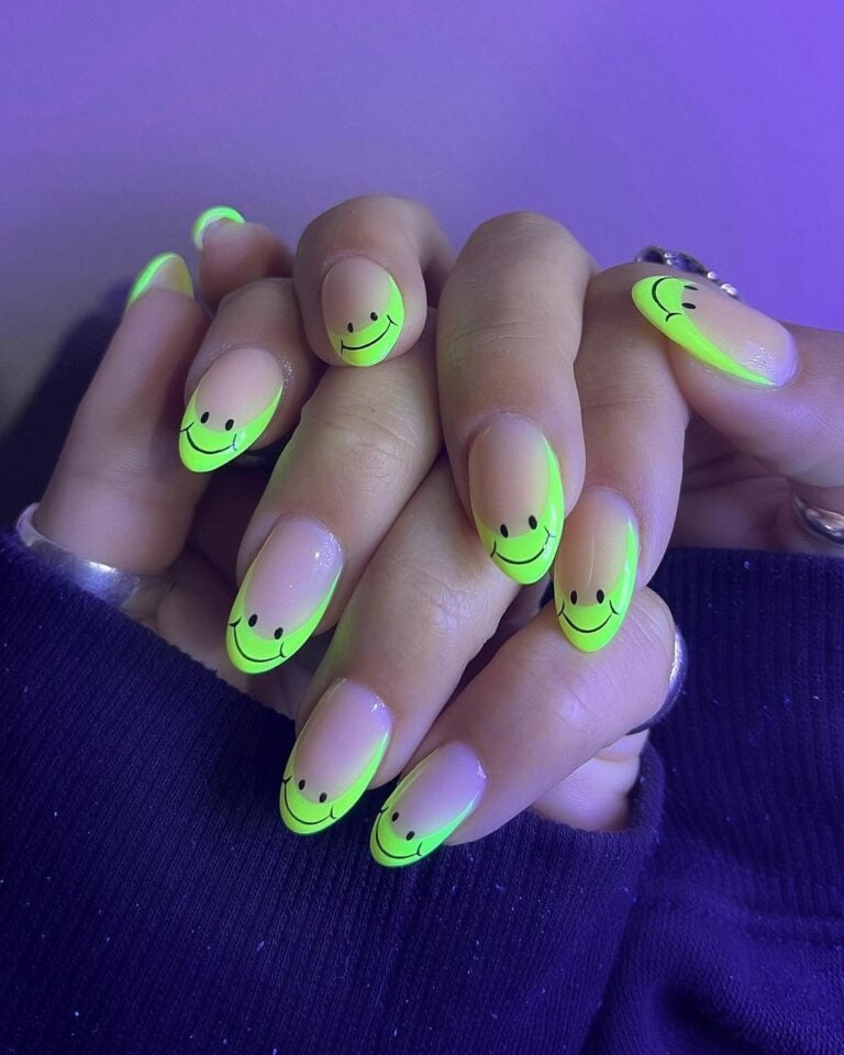 Glow in the dark smiley face nails