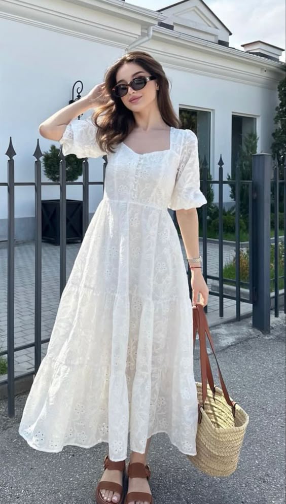 25. Graceful Elegance in a White Eyelet Maxi Dress