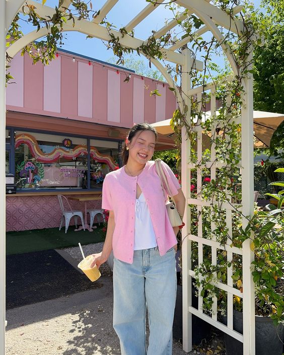 11. Soft Pink Bliss Under a Springtime Arch