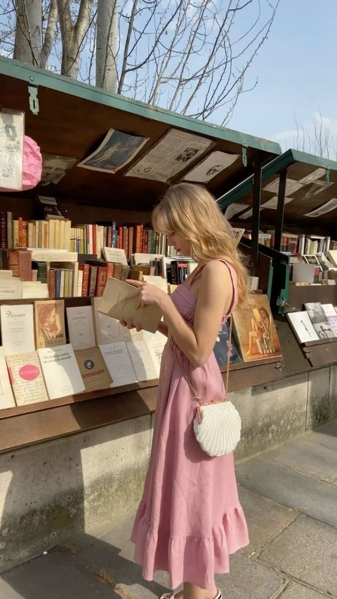 30. Soft Pink Elegance Meets Bookish Charm in the Spring Breeze