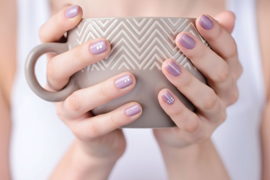 Dusty lavender square nails featuring simple white minimal line and dot art.