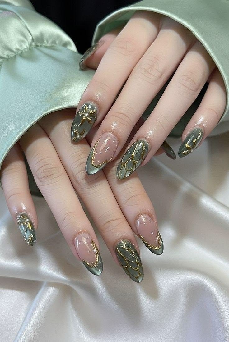 Where Elegance Meets Nature: Sage Green Nail Art with Golden Highlights