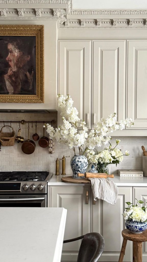 Copper pots and linen textures in a Nancy Meyers kitchen
