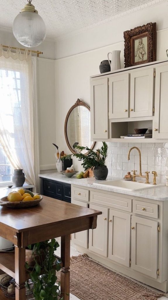 Nancy Meyers cozy kitchen in soft neutral tones