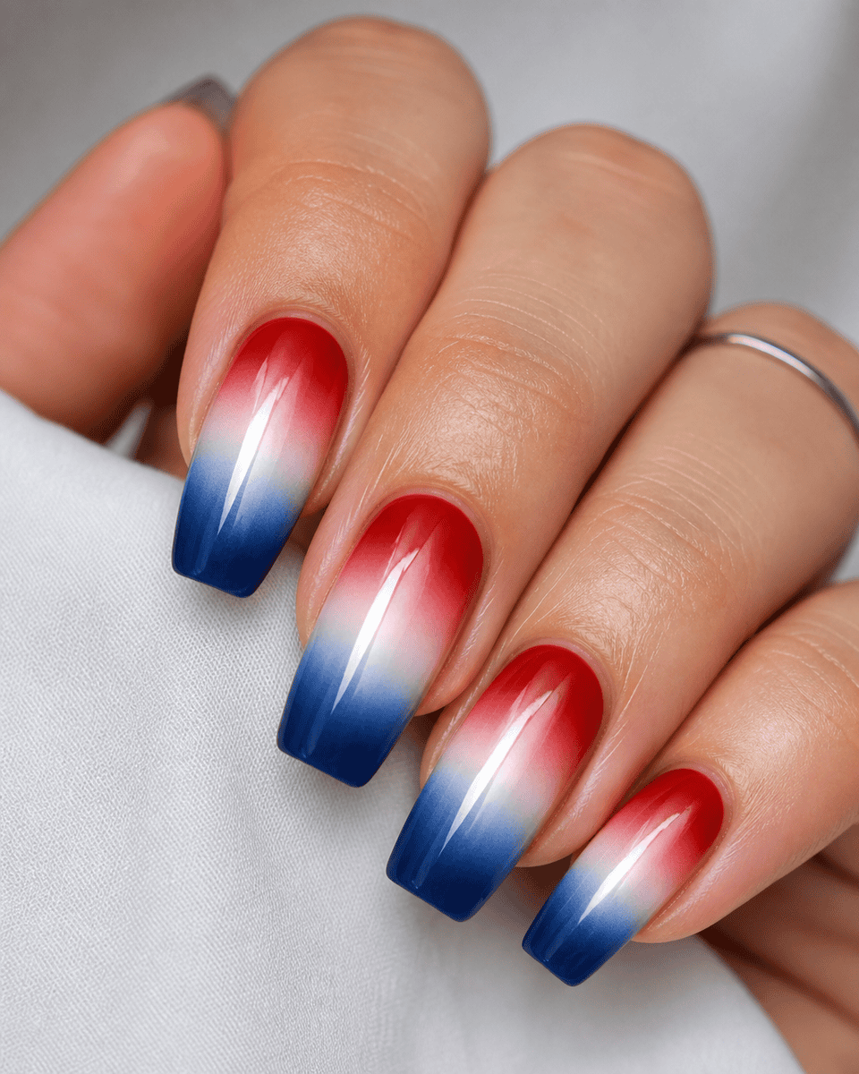 Smooth patriotic ombre gradient nails from red through white to navy blue