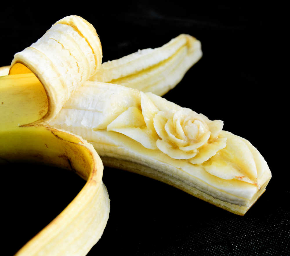 Banana carving: flesh of the banana is carved into a rose.