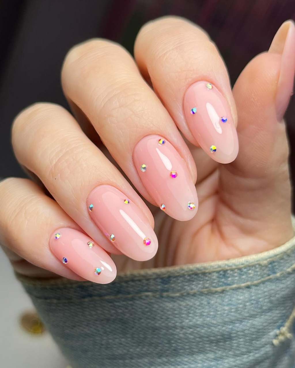 cute almond shaped simple nails with trendy rhinestone designs