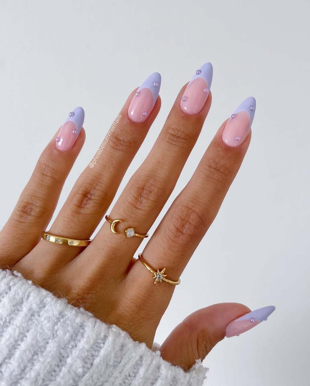 cute lavender french manicure with trendy pearl gems