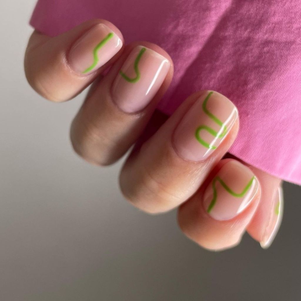 cute short simple beige nail ideas with trendy green swirly line designs